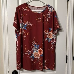Burnt orange floral blouse